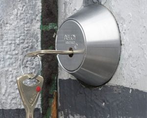Abloy brand high-security lock with a key inserted